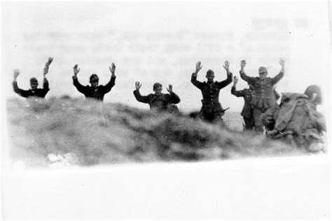 Haunting D-Day photos capturing moment Nazi soldiers surrendered to US ...