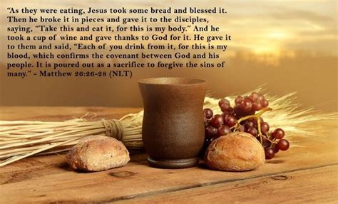 a cup and some bread on a table with the words, they were eating jesus's bread