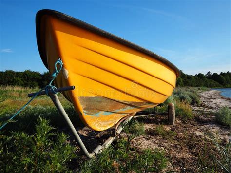 Small Dingy Boat on a Trailer Stock Photo - Image of lake, rowboat ...