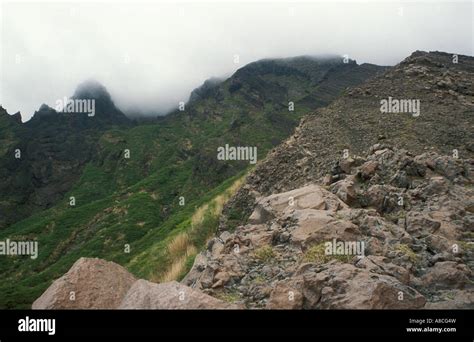 A view of Mount Aso active volcano with steam rising from the crater ...