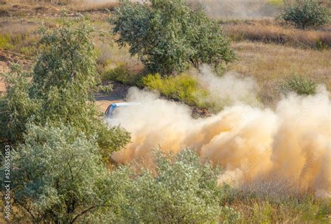 Sports Car on the Turn of the Rally Track and a Lot of Dust 09 Stock ...