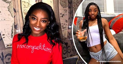 Simone Biles Flaunts Toned Belly & Navel Ring While Sipping Wine in a ...