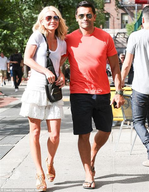 Kelly Ripa and husband Mark Consuelos, both 42, look like love's young ...