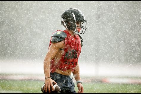 PHOTOS: Madison High School football team practices in the rain - Gazette Leader