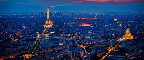 Download Witness The Beauty Of The Paris Skyline At Night Wallpaper ...