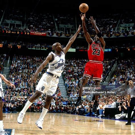 Michael Jordan of the Chicago Bulls shoots a jump shot against Bryon... News Photo - Getty Images