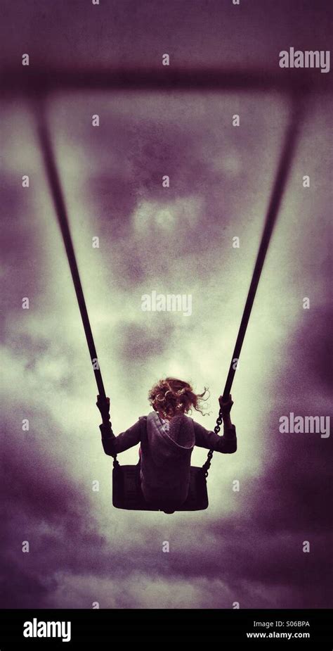 Girl on swing Stock Photo - Alamy