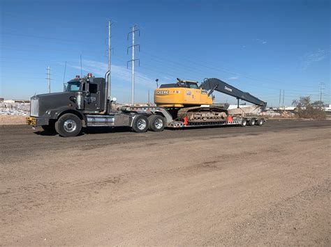 LowBoy Trailer – Specialized Transport Services