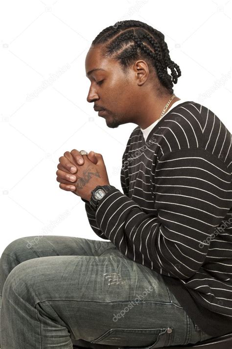 Black man praying ⬇ Stock Photo, Image by © robeo123 #8808532