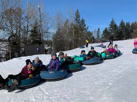 Best Snow Tubing Hills In Minnesota for Winter 2021: Tow Rope Included!