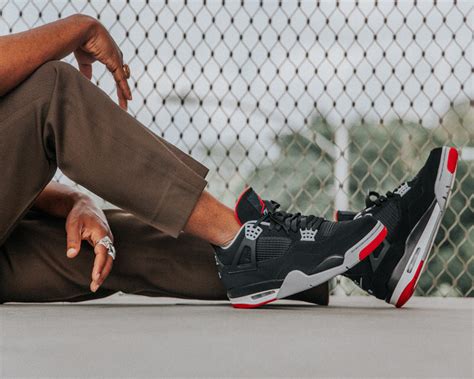 Here's How the 2019 Air Jordan 4 Black/Red Looks On Foot | Nice Kicks