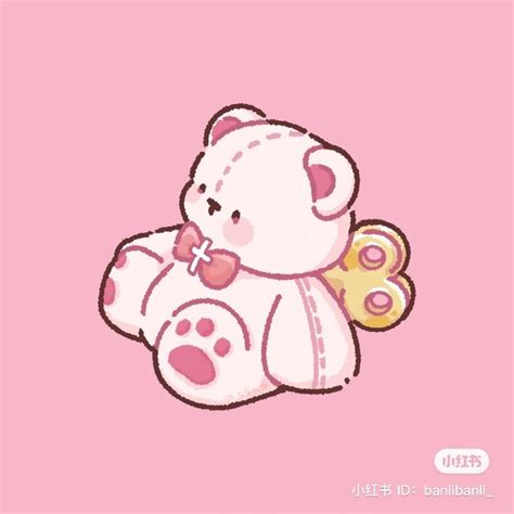 a white teddy bear with a pink bow on its neck and wings sitting in front of a pink background