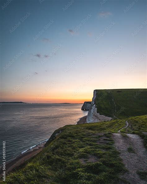 Durdle Door Sunset Stock Photo | Adobe Stock