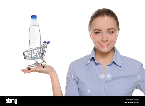 Bottle of water in shopping trolley on the palm Stock Photo - Alamy