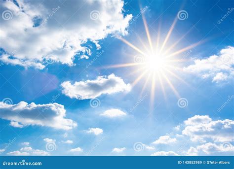 Blue sky with bright sun stock image. Image of heat - 143852989