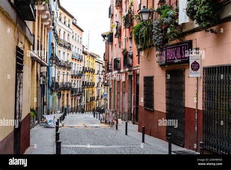 Traditional street in Embajadores area in Lavapies quarter in central ...