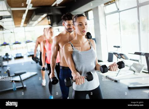 Group of people have workout in gym Stock Photo - Alamy