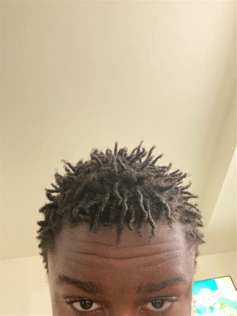 Should I pick my free forms out and let it my hair grow or just continue the journey : r/Dreadlocks