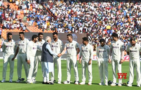 :Ahmedabad:Prime Minister Narendra Modi,shakes hand with Indian cricket ...