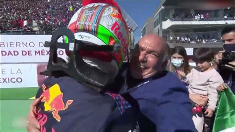 sergio perez giving his dad a huge hug after getting a podium mexico grand prix - YouTube