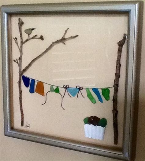 Too cute- Clothesline made of sea glass- shell- and branches... | Sea ...