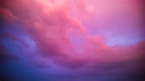 Pink And Blue Clouds Background