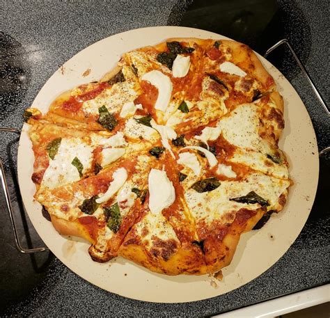 Fresh margherita pizza with home grown basil! [Homemade] : food