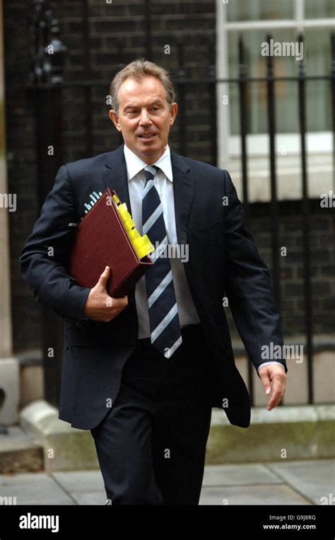 British Prime Minister Tony Blair leaves Downing Street for Parliament for the first Prime ...