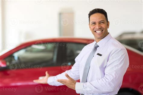 vehicle salesman presenting new cars 906569 Stock Photo at Vecteezy