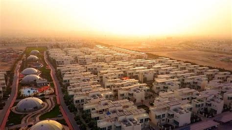 Sustainable City - Eco-Friendly Living in Dubai | AX CAPITAL