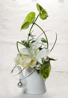 Anthurium and white Lilly Christmas Centers, Holiday Crafts Christmas, Christmas Flowers ...