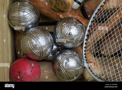 Outdoor games equipment in a box Stock Photo - Alamy