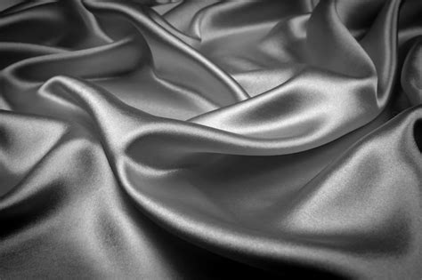 Premium Photo | Black silk texture luxurious satin for abstract background. dark tone of fabric