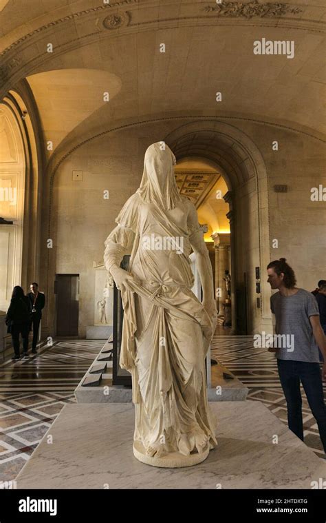 Veiled Woman statue at the Louvre museum, Paris, France Stock Photo - Alamy