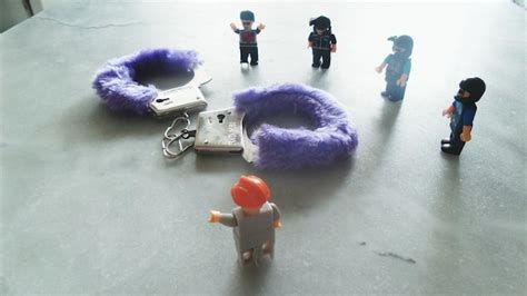 Premium Photo | High angle view of toy police with handcuff