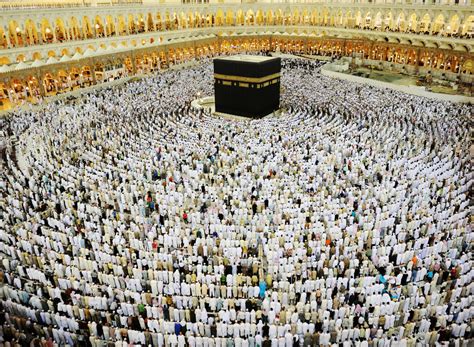 Kaaba in Mecca, Muslim people praying together at holy place Royalty-Free Stock Image - Storyblocks