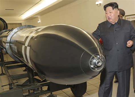 North Korea's Kim Jong Un unveils new tactical nuclear warhead