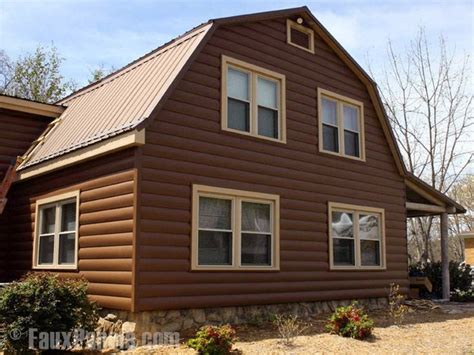 Log cabin siding made from durable vinyl, installed on a home in Spice ...