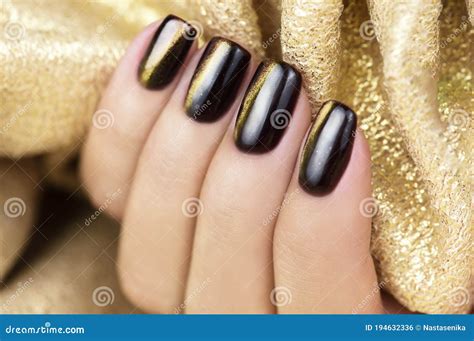 Cat Eye Nail Art. Manicure Golden Brown on a Gold Background Stock Photo - Image of hand ...