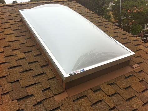 www.chandlersroofing.com Double dome, white acrylic aluminum framed skylight, installed on a new ...