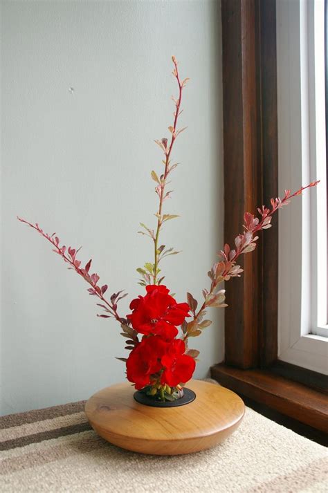 Cherry ikebana vase with Geranium and Barberry arrangement. | Ikebana vases, Ikebana, Flower ...