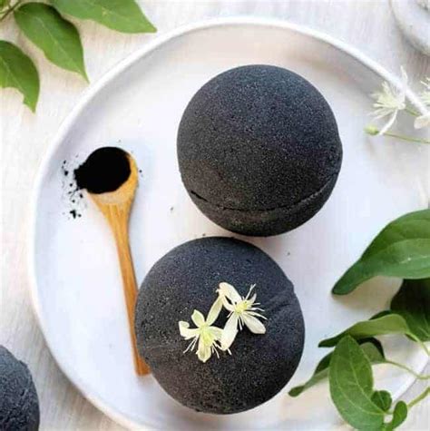 Skin-Soothing Black Bath Bombs With Activated Charcoal | Hello Glow