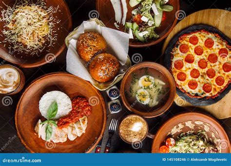 The Table is Set for a Four Course Meal. Stock Photo - Image of bowl ...