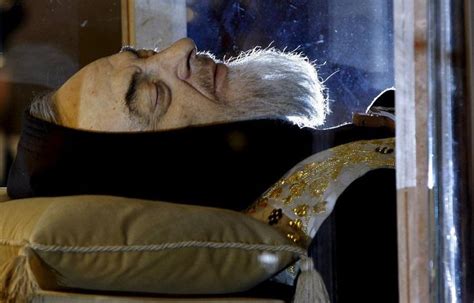 Body of Padre Pio in crystal coffin goes on the road for Holy Year ...