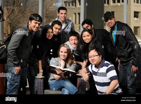 Group of diverse students inside college campus Stock Photo - Alamy