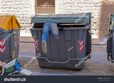 145 Dumpster diving Images, Stock Photos & Vectors | Shutterstock