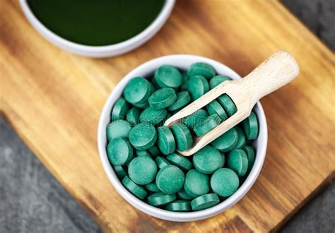 Healthy Supplements - Chlorella, Spirulina Algae Powder and Pills Stock ...