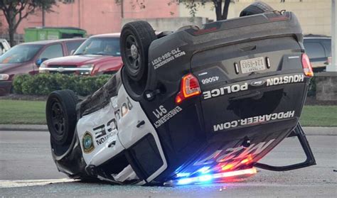 Houston police cruiser flips in crash along East Freeway - Houston Chronicle