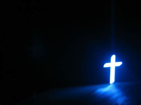 Like the stark contrast of the bright cross against a dark background blue-cross-on-at-a-church ...