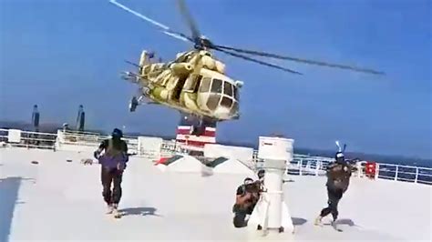 Houthi Helicopter Raid On Ship In Red Sea Seen In New Video